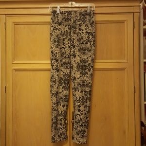 Disney through the looking glass pants